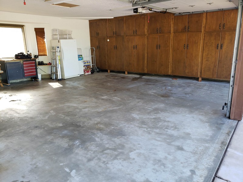 Before the application of epoxy coating to the garage floor